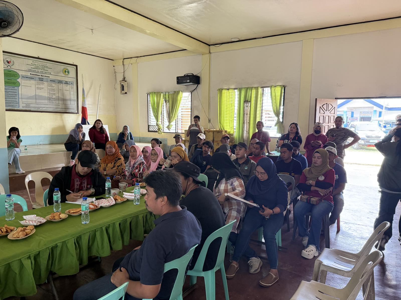 Community meeting participants during socio-economic consultation