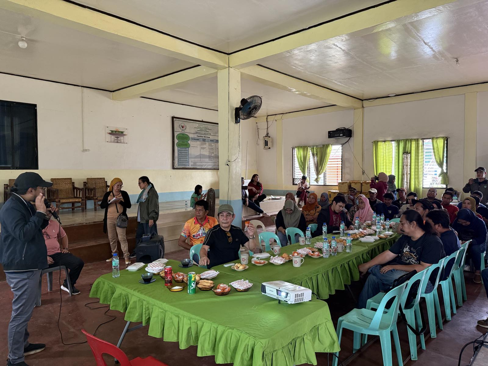 Socio-economic consultation presentation with community stakeholders