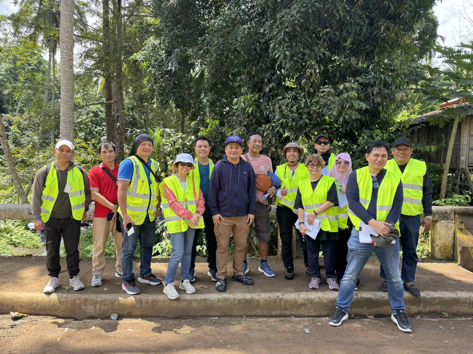 Socio-economic survey team in field vests during community fieldwork